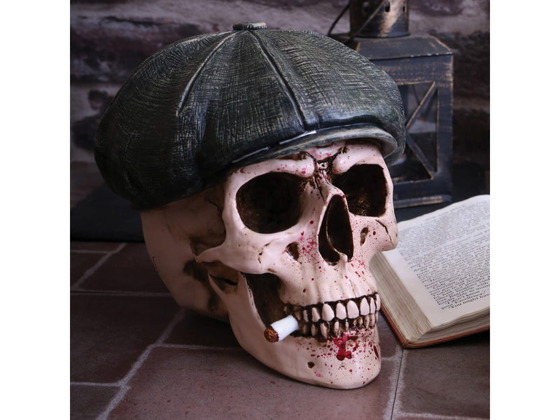 peaky blinders look alike skull with flat cap and cigareete 